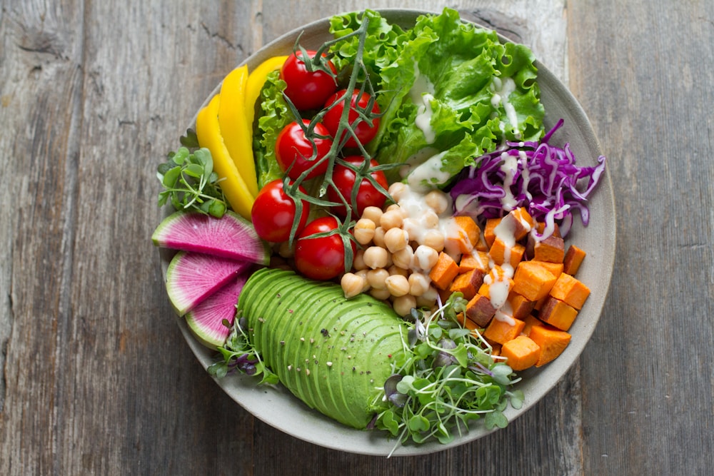 Fresh wholesome vegetables, tomatoes, and healthy oils